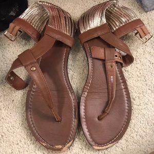 Brown and gold sandals